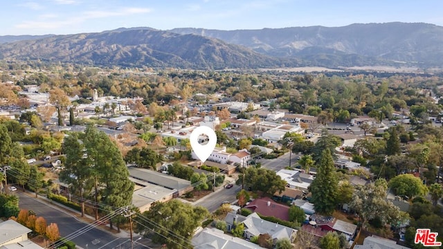 drone / aerial view featuring a mountain view