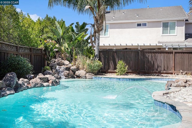 view of pool featuring pool water feature