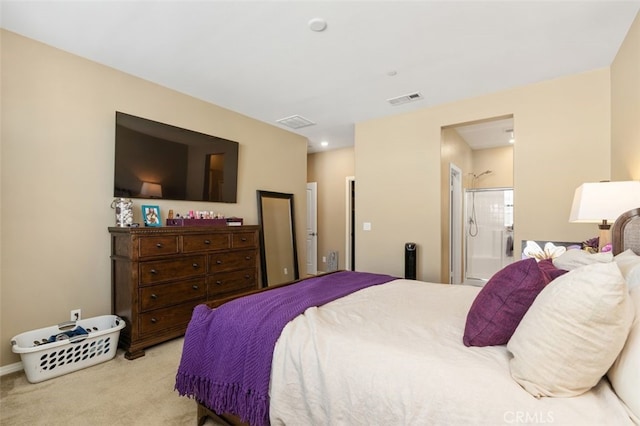 carpeted bedroom featuring connected bathroom