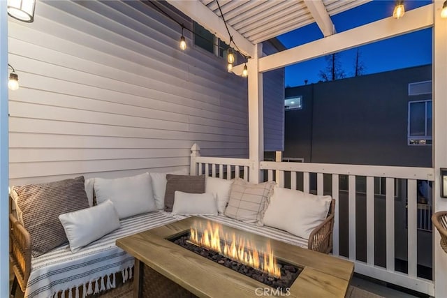 balcony featuring a fire pit