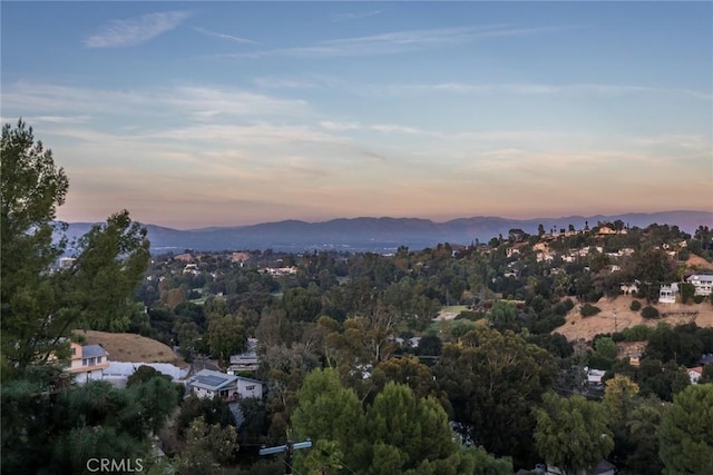 aerial view at dusk with a mountain view