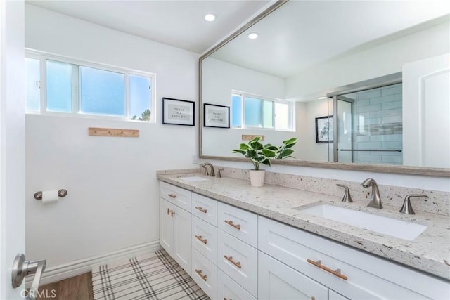 bathroom with tile patterned floors and vanity