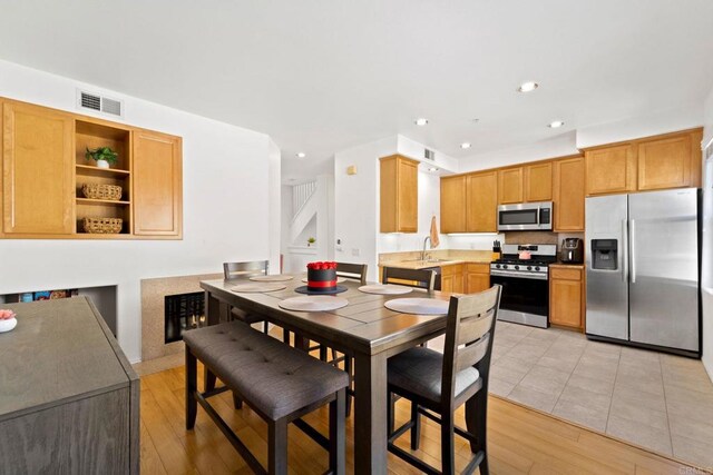 dining room featuring light wood-type flooring