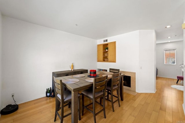 dining space featuring light hardwood / wood-style floors