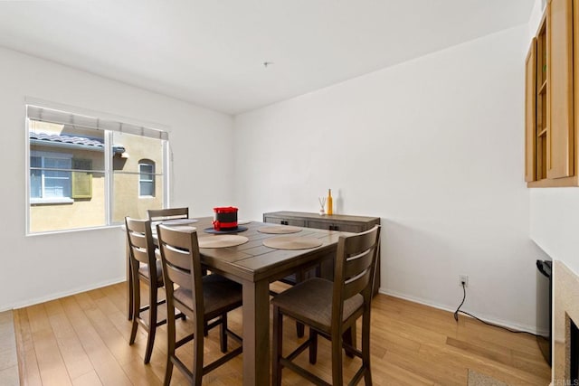 dining room with light wood-type flooring