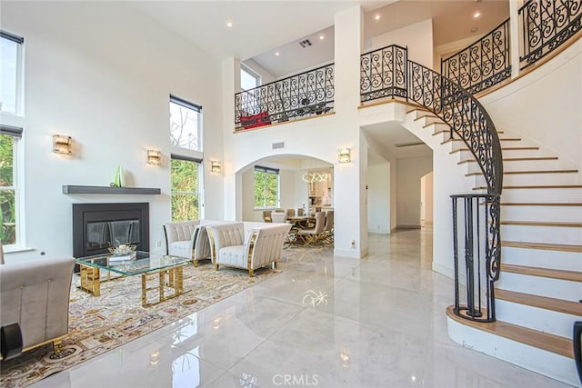 living room with a high ceiling