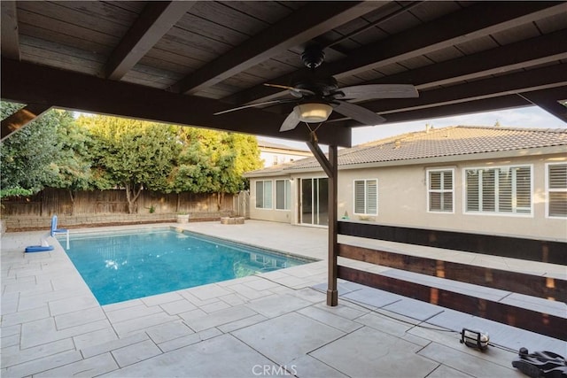 view of pool featuring ceiling fan and a patio