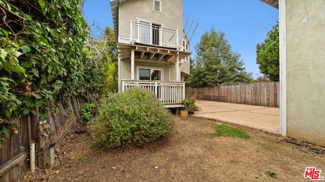 rear view of house featuring a patio area