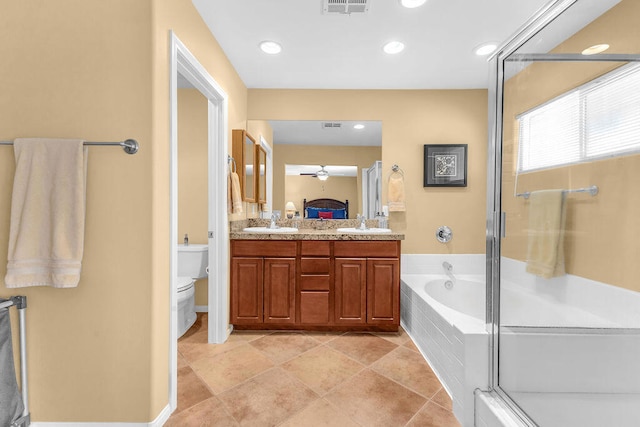 full bathroom featuring toilet, ceiling fan, separate shower and tub, tile patterned flooring, and vanity