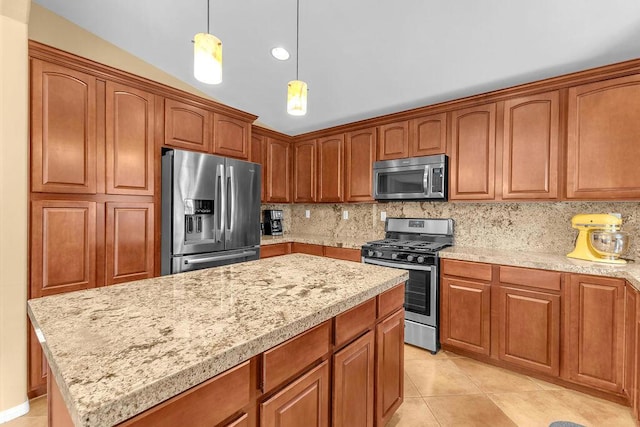 kitchen with stainless steel appliances, backsplash, light tile patterned flooring, hanging light fixtures, and a kitchen island