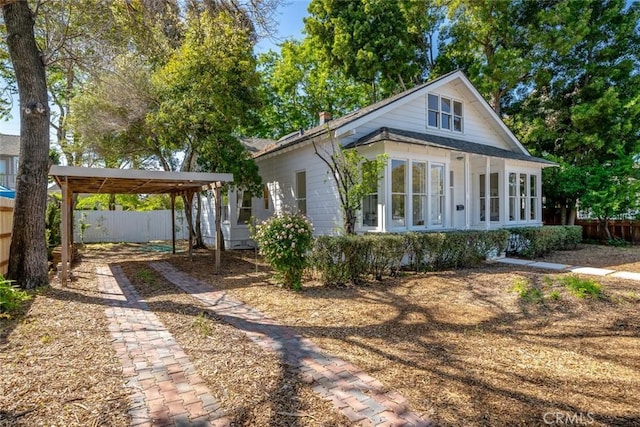 view of front of house featuring a carport