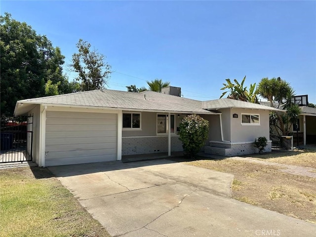 single story home featuring a garage