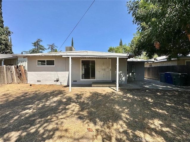 back of house featuring a patio