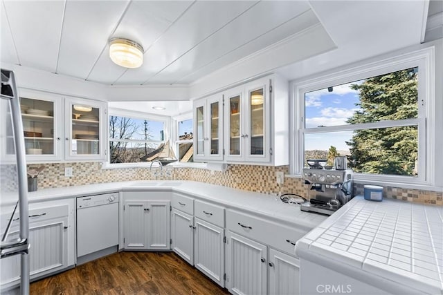 347 Emerald Dr, Lake Arrowhead, CA 92352 - kitchen featuring dishwasher, backsplash, white cabinetry, and tile countertops