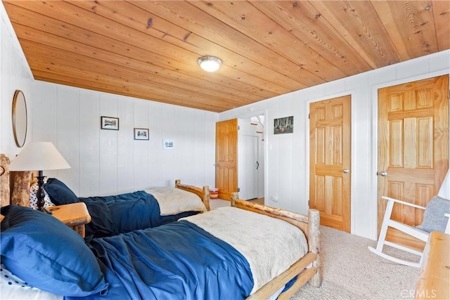 347 Emerald Dr, Lake Arrowhead, CA 92352 - carpeted bedroom featuring wood ceiling and wood walls