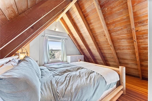 bedroom featuring vaulted ceiling with beams, wood ceiling, and hardwood / wood-style floors