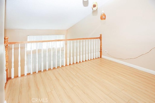 spare room with hardwood / wood-style floors