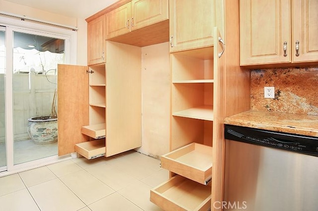 mudroom with light tile patterned floors