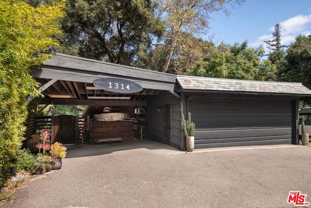 exterior space with a carport