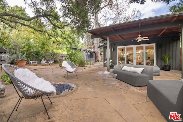 view of patio featuring ceiling fan and an outdoor hangout area