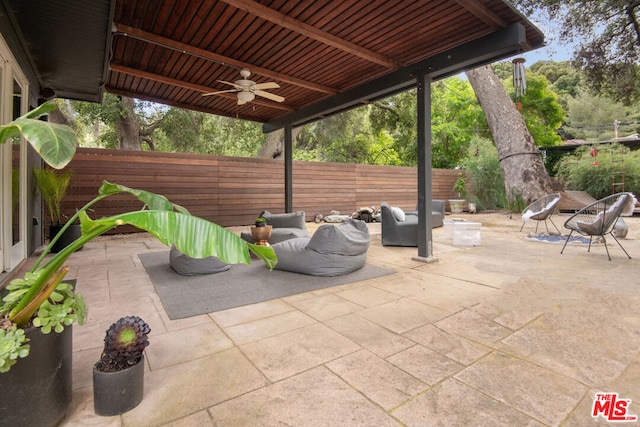 view of patio / terrace featuring ceiling fan