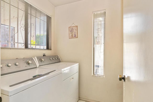 laundry room with independent washer and dryer