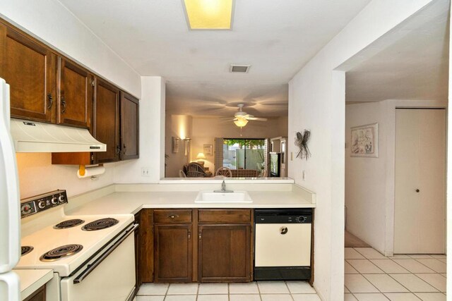 kitchen with ceiling fan, light tile patterned floors, sink, and white appliances