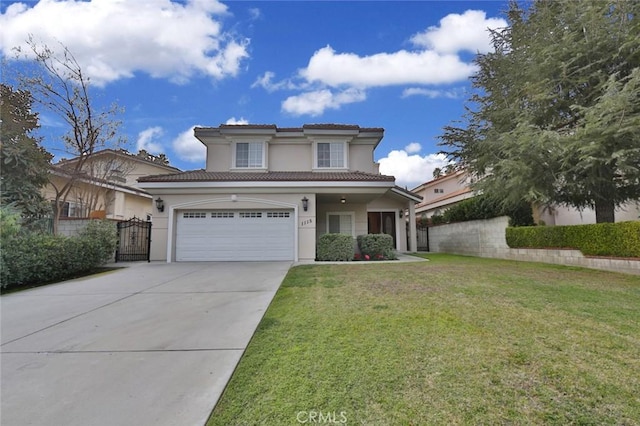 view of front facade featuring a garage and a front lawn