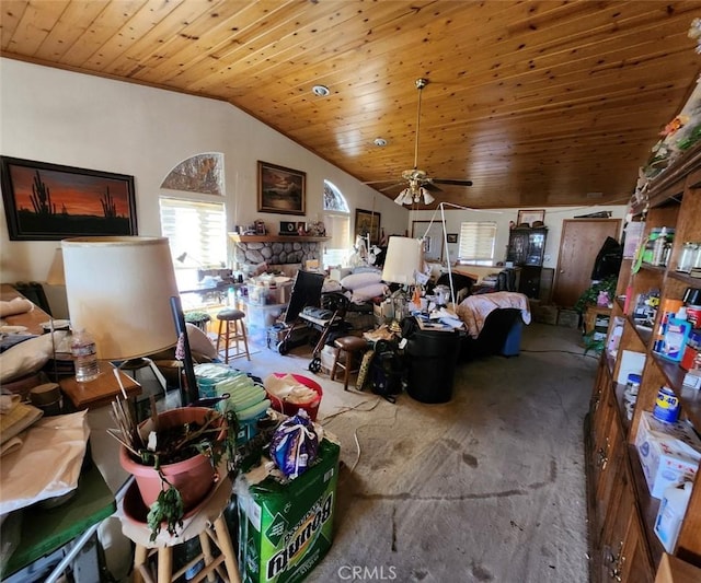 interior space with ceiling fan, lofted ceiling, carpet, and wooden ceiling