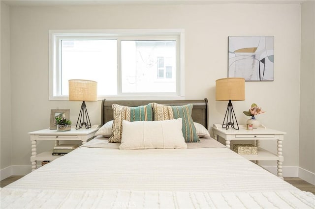 bedroom featuring hardwood / wood-style floors