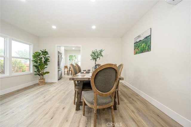 dining area with light wood-type flooring