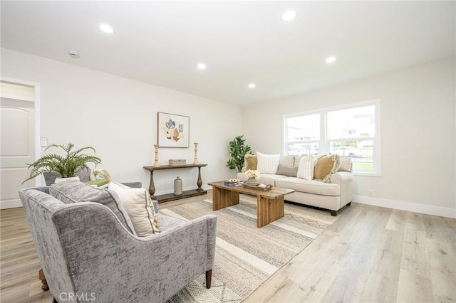 living room with light hardwood / wood-style floors