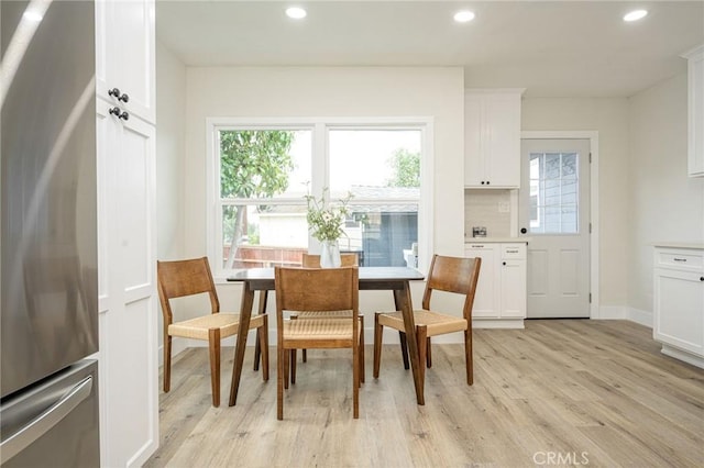 dining room featuring light hardwood / wood-style floors