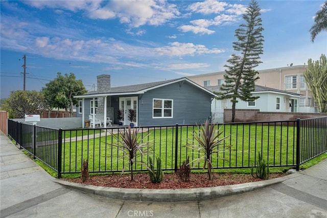 ranch-style house with a porch and a front yard