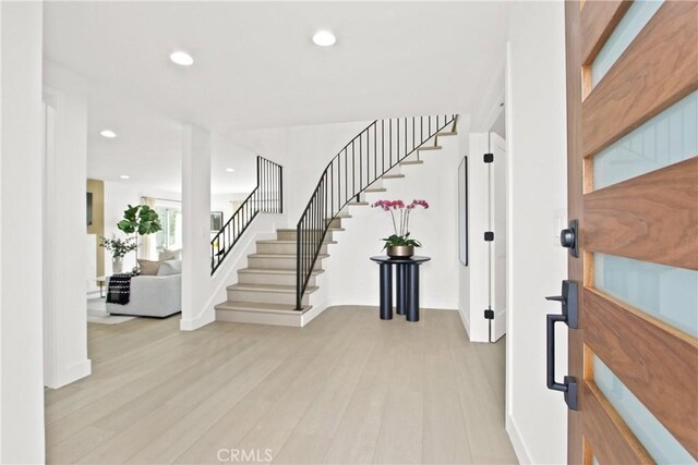 entrance foyer featuring light wood-type flooring