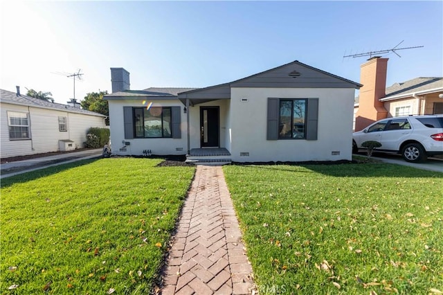 view of front of house with a front lawn