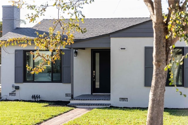 view of front of home featuring a front lawn