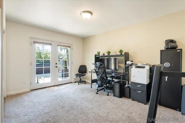 carpeted office with french doors