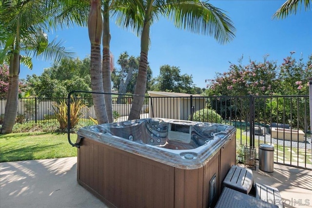 view of patio with a hot tub