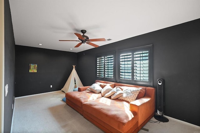 carpeted bedroom with ceiling fan