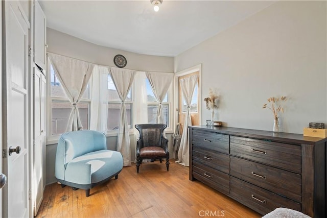 living area with light hardwood / wood-style floors