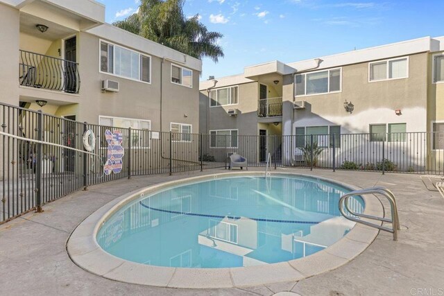 6602 Beadnell Way Unit 14, San Diego, CA 92117 - community pool featuring an AC wall unit