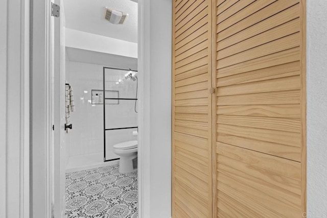 6602 Beadnell Way Unit 14, San Diego, CA 92117 - full bath with a stall shower, a closet, and tile patterned flooring