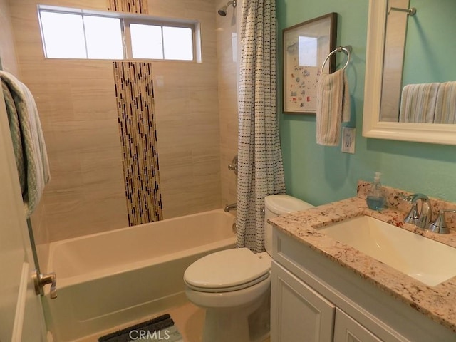 full bathroom with toilet, shower / tub combo, and vanity