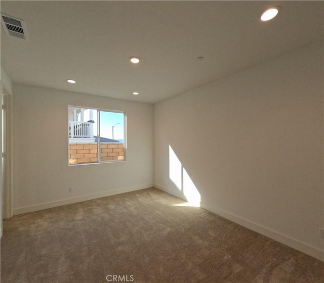 view of carpeted spare room