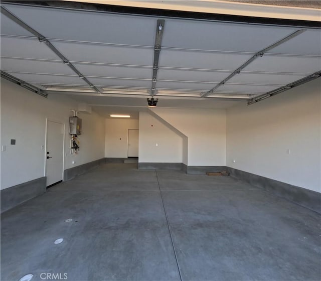 garage featuring water heater