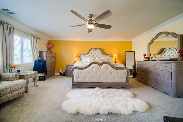 bedroom featuring light carpet, ceiling fan, and ornamental molding