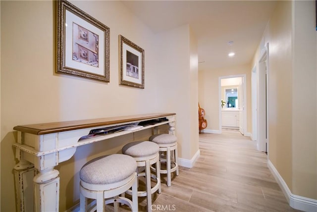 corridor featuring light hardwood / wood-style flooring