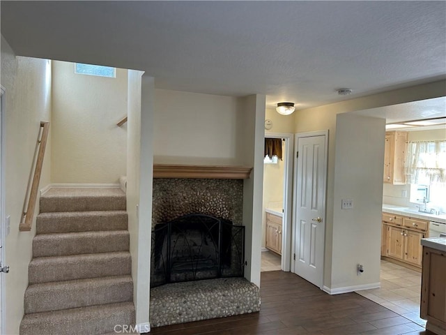 interior space with a premium fireplace and hardwood / wood-style floors