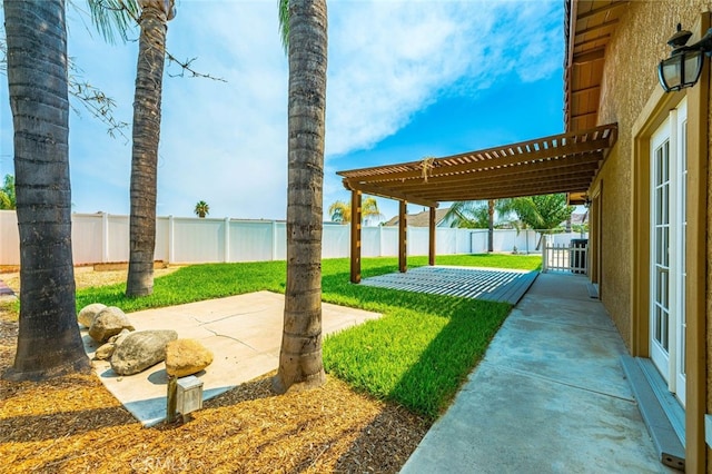 view of yard featuring a patio area and a pergola